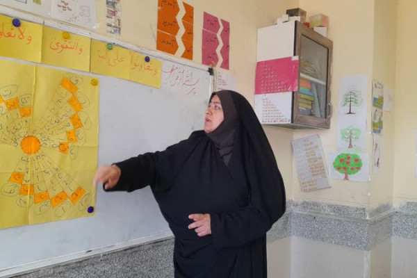 برگزاری طرح زندگی با آیه ها در  مدرسه شهید اشرفی اصفهانی شهرستان ملکشاهی